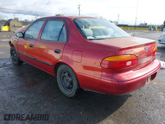 2001 Chevrolet Prizm z VIN 1Y1SK528X1Z406430, wystawiony jako IAAI lot #41789273 z przebiegiem 185 620 mil mil oraz . Historia ofert i sprzedaży dostępna na DreamBid. Obrazek 3.