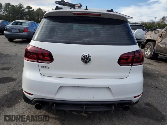 2013 Volkswagen GTI с VIN WVWED7AJ5DW088380, выставлен на аукционе Copart как лот 49300945 с пробегом 111 209 миль миль и Списание • Salvage title. История ставок и продаж доступна на DreamBid. Изображение 6.