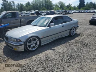 1997 BMW 3 Series 328is with VIN WBABG2325VET34772, listed as a Copart auction lot 65781905 with 213,190 mi miles and Clean title. Bid and sale history available at DreamBid. Image 1.