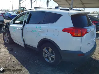 2015 Toyota RAV4 XLE with VIN JTMWFREV9FJ034992, listed as a IAAI auction lot 41922694 with 100,956 mi miles. Bid and sale history available at carsss.com. Image 3.