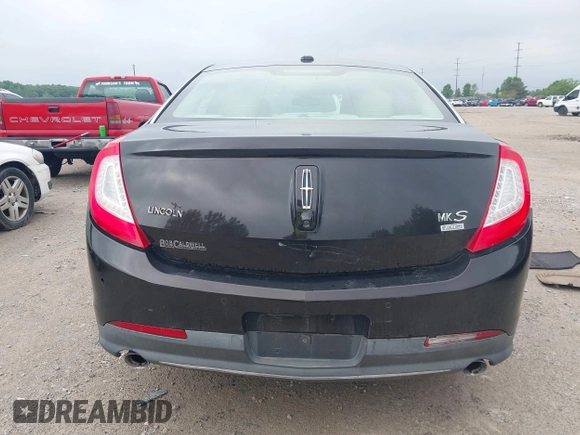 2013 Lincoln MKS z VIN 1LNHL9EK0DG600129, wystawiony jako IAAI lot #42314913 z przebiegiem 119 674 mil mil oraz . Historia ofert i sprzedaży dostępna na DreamBid. Obrazek 17.