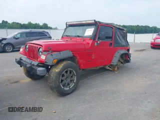 2001 Jeep Wrangler Sport z VIN 1J4FA49S31P335680, wystawiony jako IAAI lot #42471312 z przebiegiem 212 927 mil mil oraz . Historia ofert i sprzedaży dostępna na DreamBid. Obrazek 2.