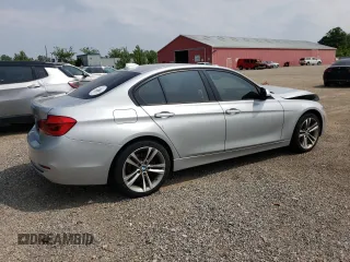 2018 BMW 3 Series 330i xDrive with VIN WBA8D9C54JEM34426, listed as a Copart auction lot 60487205 with 158,224 mi miles and Salvage title. Bid and sale history available at DreamBid. Image 3.