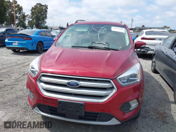 2019 Ford Escape Titanium with VIN 1FMCU0J96KUB79330, listed as a IAAI auction lot 42018346 with 35,500 mi miles and . Bid and sale history available at DreamBid. Image 13.
