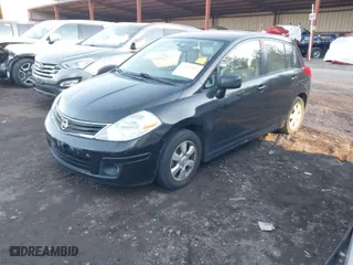 2011 Nissan Versa 1.8 S with VIN 3N1BC1CP5BL385675, listed as a IAAI auction lot 41390597 with 204,069 mi miles. Bid and sale history available at carsss.com. Image 2.