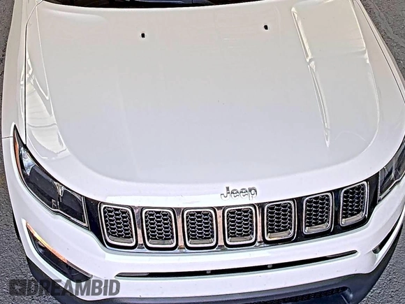 2019 Jeep Compass Latitude z VIN 3C4NJDBB1KT639096, wystawiony jako IAAI lot #42597978 z przebiegiem 110 803 mil mil oraz . Historia ofert i sprzedaży dostępna na DreamBid. Obrazek 43.