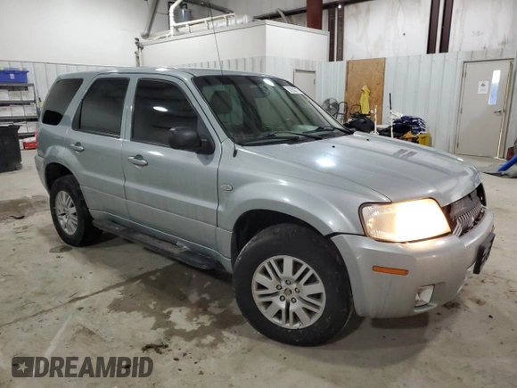 2005 Mercury Mariner Luxury z VIN 4M2CU57135DJ00228, wystawiony jako Copart lot #87603775 z przebiegiem 169 099 mil mil oraz Szkody całkowita. Historia ofert i sprzedaży dostępna na DreamBid. Obrazek 4.