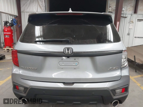 2023 Honda Passport EX-L with VIN 5FNYF8H56PB025612, listed as a IAAI auction lot 41937956 with 31,065 mi miles and . Bid and sale history available at DreamBid. Image 16.