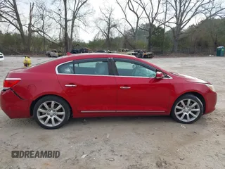 2013 Buick LaCrosse Touring z VIN 1G4GJ5E30DF289424, wystawiony jako IAAI lot #41248367 z przebiegiem 119 732 mil mil oraz . Historia ofert i sprzedaży dostępna na DreamBid. Obrazek 13.