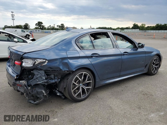 2023 BMW 5 Series M550i xDrive with VIN WBA13BK06PCM31937, listed as a Copart auction lot 66490494 with 24,972 mi miles and Salvage title. Bid and sale history available at DreamBid. Image 3.