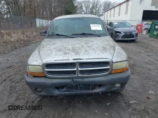 2004 Dodge Dakota Sport with VIN 1D7HG38K54S634958, listed as a IAAI auction lot 41831018 with 135,917 mi miles. Bid and sale history available at carsss.com. Image 6.