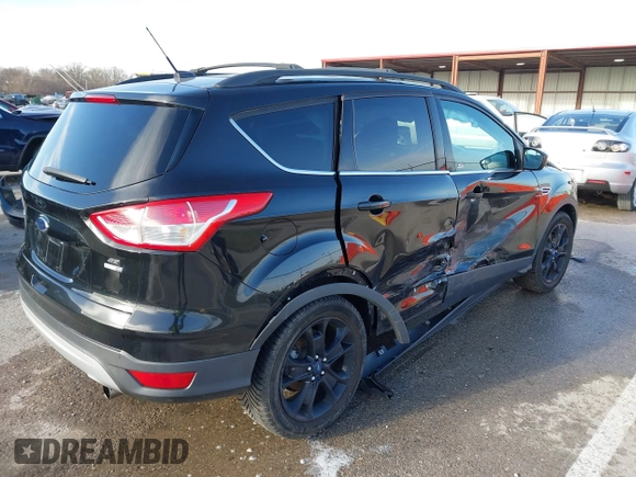 2013 Ford Escape SE with VIN 1FMCU9GX9DUB92246, listed as a IAAI auction lot 41808372 with 73,472 mi miles. Bid and sale history available at carsss.com. Image 4.