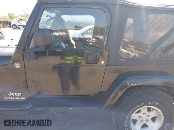 2005 Jeep Wrangler X with VIN 1J4FA39S35P372731, listed as a IAAI auction lot 41875121 with 146,034 mi miles and . Bid and sale history available at DreamBid. Image 14.