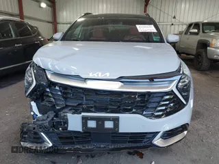 2024 Kia Sportage SX-Prestige z VIN 5XYK53DF2RG180390, wystawiony jako IAAI lot #42205645 z przebiegiem 9 330 mil mil oraz . Historia ofert i sprzedaży dostępna na DreamBid. Obrazek 12.