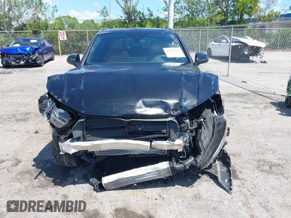 2023 Audi Q5 S line Premium Plus z VIN WA1EAAFY6P2168594, wystawiony jako IAAI lot #41863196 z przebiegiem 16 310 mil mil oraz . Historia ofert i sprzedaży dostępna na DreamBid. Obrazek 12.