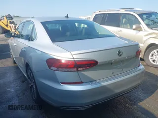 2021 Volkswagen Passat SE with VIN 1VWSA7A38MC012907, listed as a IAAI auction lot 42581889 with 76,001 mi miles and . Bid and sale history available at DreamBid. Image 3.