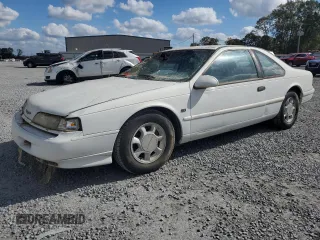 1993 Ford Thunderbird LX z VIN 1FAPP62T6PH189176, wystawiony jako Copart lot #78146094 z przebiegiem 107 514 mil mil oraz Szkoda całkowita • Salvage title. Historia ofert i sprzedaży dostępna na DreamBid. Obrazek 1.