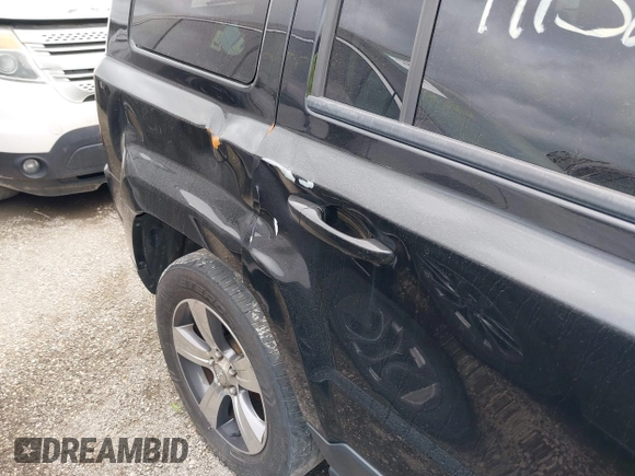 2016 Jeep Patriot Latitude with VIN 1C4NJRFB6GD581829, listed as a IAAI auction lot 41749132 with 106,614 mi miles and . Bid and sale history available at DreamBid. Image 13.