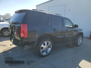 2009 GMC Yukon SLT w/4SB with VIN 1GKFK33059R106202, listed as a Copart auction lot 46700985 with 156,709 mi miles and Salvage Title. Bid and sale history available at carsss.com. Image 3.