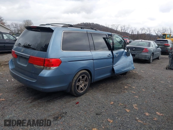 2008 Honda Odyssey EX-L with VIN 5FNRL38678B092343, listed as a IAAI auction lot 40974522 with 209,280 mi miles and . Bid and sale history available at DreamBid. Image 4.