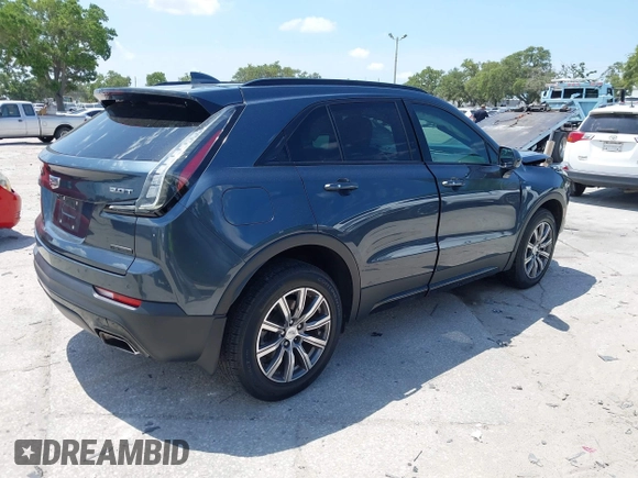 2019 Cadillac XT4 FWD Sport with VIN 1GYFZER42KF107032, listed as a IAAI auction lot 42193557 with 96,615 mi miles and . Bid and sale history available at DreamBid. Image 4.