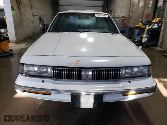 1996 Oldsmobile Cutlass Ciera with VIN 1G3AJ85M4T6309287, listed as a Copart auction lot 83699894 with 94,876 mi miles and Clean Title. Bid and sale history available at DreamBid. Image 5.