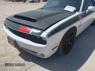 2019 Dodge Challenger R/T Scat Pack Widebody z VIN 2C3CDZFJ1KH546489, wystawiony jako IAAI lot #41857292 z przebiegiem 61 055 mil mil oraz . Historia ofert i sprzedaży dostępna na DreamBid. Obrazek 6.