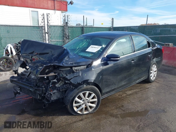 2014 Volkswagen Jetta Sedan SE w/Connectivity/Sunroof PZEV with VIN 3VWD17AJ5EM422359, listed as a IAAI auction lot 38090147 with 51,234 mi miles. Bid and sale history available at carsss.com. Image 2.
