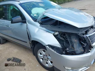 2014 Chevrolet Traverse LS z VIN 1GNKVFED1EJ334488, wystawiony jako IAAI lot #42199428 z przebiegiem Nie podano mil oraz . Historia ofert i sprzedaży dostępna na DreamBid. Obrazek 18.