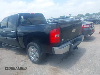 2011 Chevrolet Silverado 1500 LT with VIN 3GCPCSE06BG391860, listed as a IAAI auction lot 42077801 with 214,709 mi miles and . Bid and sale history available at DreamBid. Image 3.