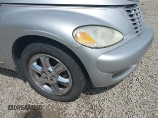 2005 Chrysler PT Cruiser Touring with VIN 3C3EY55E35T297313, listed as a IAAI auction lot 42177380 with 87,677 mi miles and . Bid and sale history available at DreamBid. Image 6.