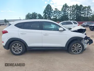 2016 Hyundai Tucson SE z VIN KM8J3CA43GU092864, wystawiony jako IAAI lot #40366787 z przebiegiem 126 462 mil mil oraz . Historia ofert i sprzedaży dostępna na DreamBid. Obrazek 13.