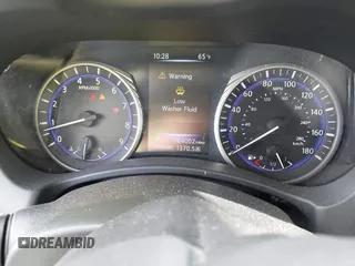2015 Infiniti Q50 Premium z VIN JN1BV7AR1FM398047, wystawiony jako IAAI lot #42203862 z przebiegiem 104 002 mil mil oraz . Historia ofert i sprzedaży dostępna na DreamBid. Obrazek 7.