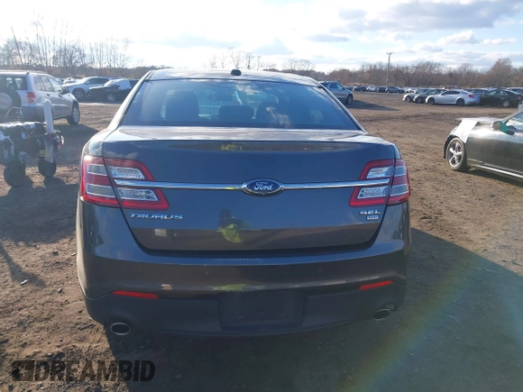 2015 Ford Taurus SEL with VIN 1FAHP2H86FG174102, listed as a IAAI auction lot 40997366 with 132,543 mi miles. Bid and sale history available at carsss.com. Image 16.