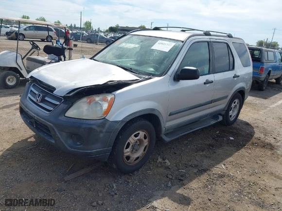 2005 Honda CR-V LX with VIN JHLRD68565C015724, listed as a IAAI auction lot 42021737 with 207,142 mi miles. Bid and sale history available at carsss.com. Image 2.