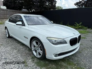 2012 BMW 7 Series with VIN WBAKX6C59CC197233, listed as a IAAI auction lot 42717342 with 93,408 mi miles and . Bid and sale history available at DreamBid. Image 1.