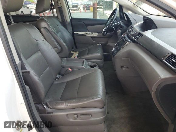 2014 Honda Odyssey Touring z VIN 5FNRL5H9XEB123330, wystawiony jako Copart lot #59023145 z przebiegiem 118 371 mil mil oraz Nie do naprawy • Non repairable. Historia ofert i sprzedaży dostępna na DreamBid. Obrazek 7.