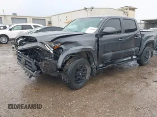 2022 Toyota Tacoma SR5 with VIN 3TMAZ5CN9NM195132, listed as a IAAI auction lot 42383482 with 51,011 mi miles and . Bid and sale history available at DreamBid. Image 2.