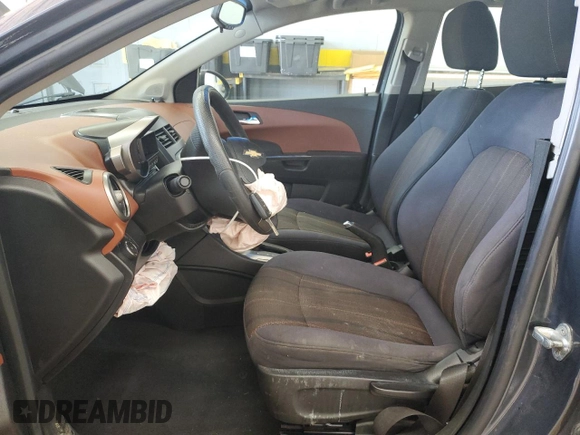 2012 Chevrolet Sonic LT with VIN 1G1JC5SH3C4192144, listed as a Copart auction lot 60973395 with 141,306 mi miles and Salvage title. Bid and sale history available at DreamBid. Image 7.