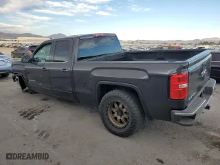 2014 GMC Sierra 1500 SLE with VIN 1GTR1UEH3EZ149869, listed as a Copart auction lot 79744924 with 112,564 mi miles and Salvage Title. Bid and sale history available at carsss.com. Image 2.