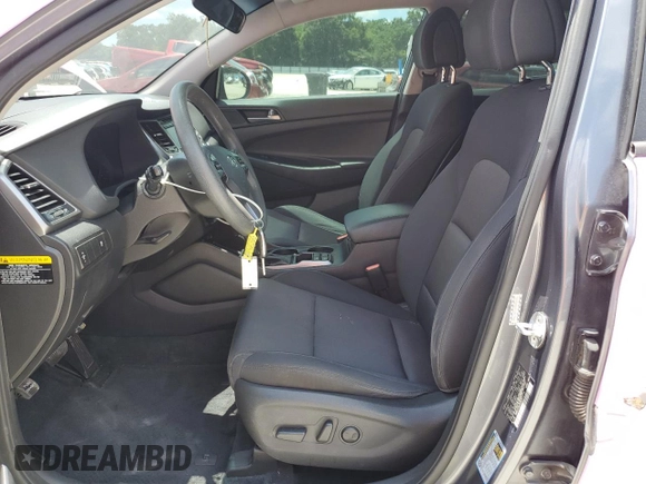 2017 Hyundai Tucson Value with VIN KM8J33A25HU332514, listed as a Copart auction lot 56958845 with 99,818 mi miles and Salvage title. Bid and sale history available at DreamBid. Image 7.