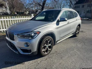 2016 BMW X1 xDrive28i with VIN WBXHT3Z3XG4A49854, listed as a Copart auction lot 88170415 with 150,784 mi miles and Clean Title. Bid and sale history available at DreamBid. Image 2.