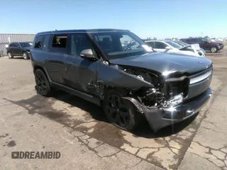 2024 Rivian R1S Adventure z VIN 7PDSGCBA7RN031539, wystawiony jako IAAI lot #42147306 z przebiegiem 22 212 mil mil oraz . Historia ofert i sprzedaży dostępna na DreamBid. Obrazek 1.