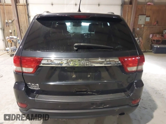 2013 Jeep Grand Cherokee Laredo with VIN 1C4RJFAG9DC583269, listed as a IAAI auction lot 41241085 with 147,995 mi miles. Bid and sale history available at carsss.com. Image 16.