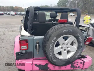 2015 Jeep Wrangler Sport with VIN 1C4AJWAG3FL589214, listed as a IAAI auction lot 41056259 with 101,758 mi miles and . Bid and sale history available at DreamBid. Image 15.
