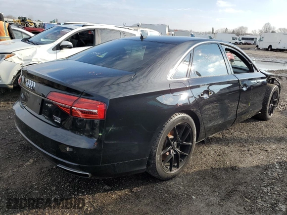 2016 Audi A8 with VIN WAUK3AFD8GN008759, listed as a Copart auction lot 81256324 with 86,244 mi miles and Salvage title. Bid and sale history available at DreamBid. Image 3.