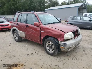 2001 Suzuki Grand Vitara JLX with VIN JS3TD62V414164442, listed as a Copart auction lot 45880615 with 125,466 mi miles and Salvage Title. Bid and sale history available at carsss.com. Image 4.