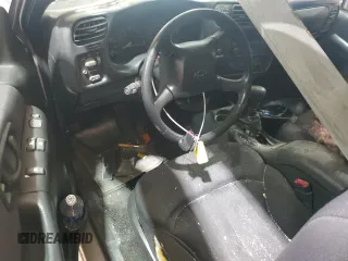 2004 Chevrolet Blazer LS z VIN 1GNCT18X34K143280, wystawiony jako Copart lot #50494785 z przebiegiem Nie podano mil oraz Szkoda całkowita • Salvage title. Historia ofert i sprzedaży dostępna na DreamBid. Obrazek 8.