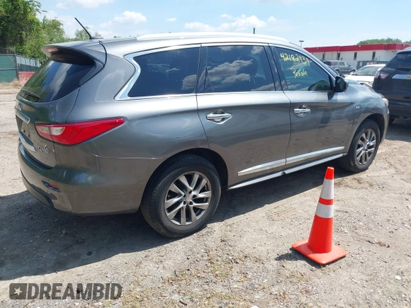 2015 Infiniti QX60 z VIN 5N1AL0MM3FC521774, wystawiony jako IAAI lot #42182939 z przebiegiem 99 438 mil mil oraz . Historia ofert i sprzedaży dostępna na DreamBid. Obrazek 4.