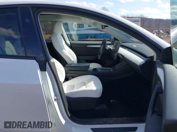 2024 Tesla Model Y with VIN 7SAYGDED2RF089010, listed as a IAAI auction lot 41630222 with 18,366 mi miles and . Bid and sale history available at carsss.com. Image 5.